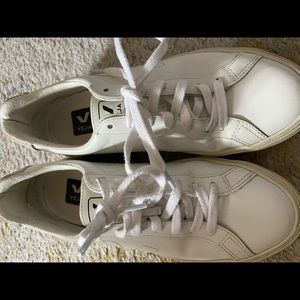 Veja size 7 womens shoes. Sustainable leather. Stitched V logo at sides.